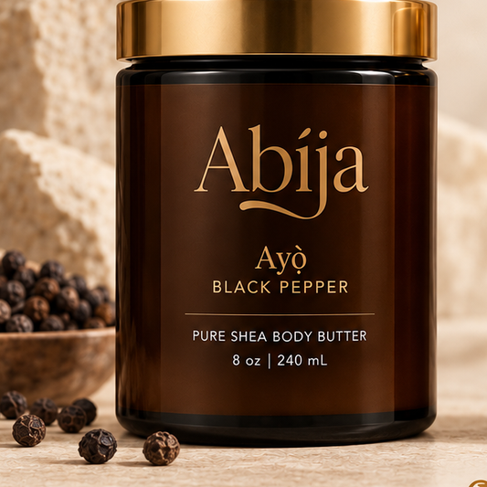 Ayò Black Pepper whipped shea body butter in an amber glass jar with gold lid – Abija Skin